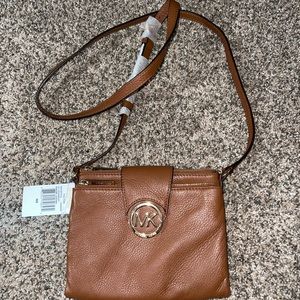 Genuine Leather Michael Kors crossbody.
